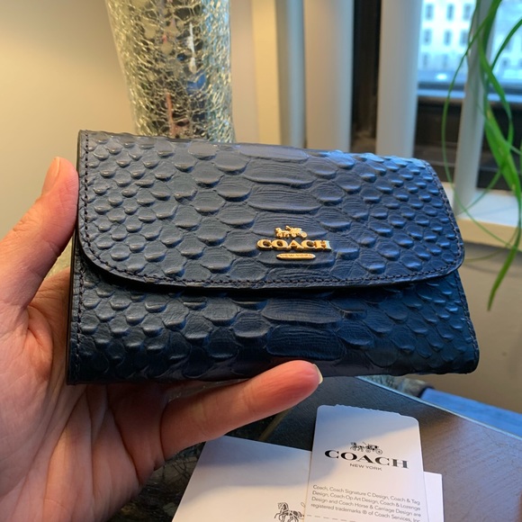 Coach Handbags - Authentic Coach metallic python Embossed wallet🦋